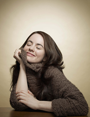 Smiling woman in sweater
